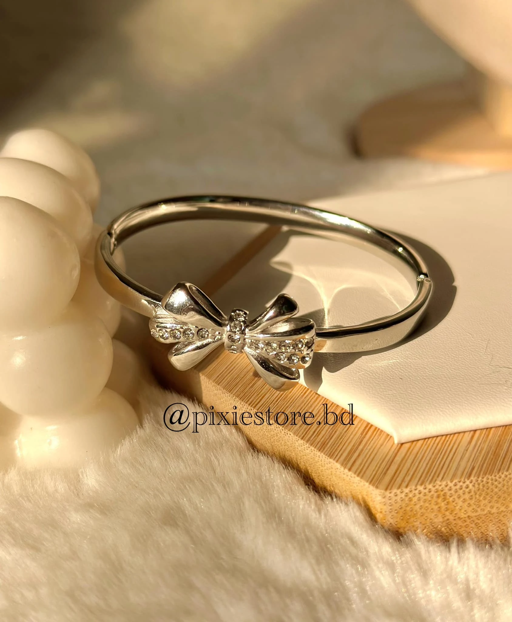 Silver Étoile Bow Cuff