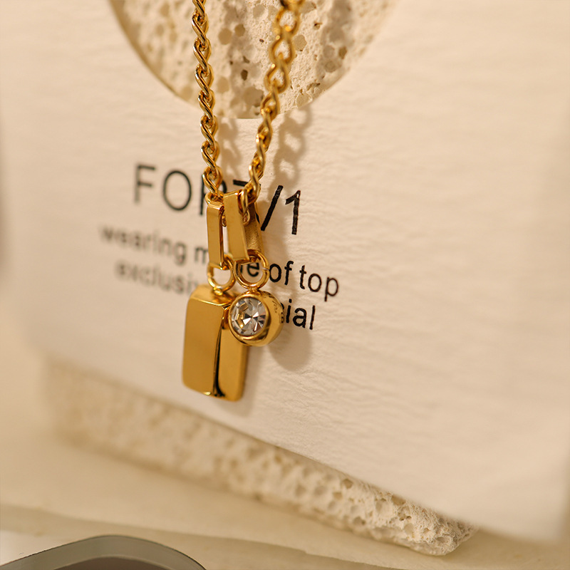 Gold bar pendant